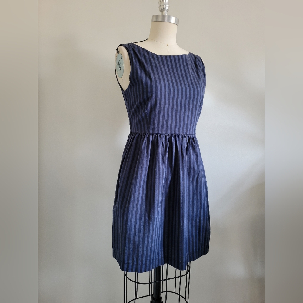 Blue striped dress with boat neck and gathered skirt